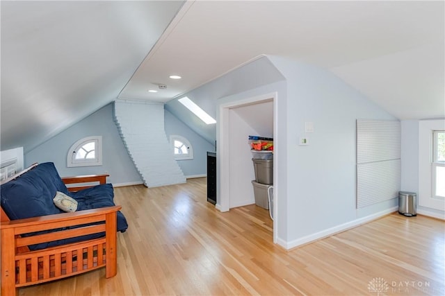 135 E Dixon Ave, Oakwood, OH 45419 - bonus room with light wood finished floors, lofted ceiling, plenty of natural light, and baseboards
