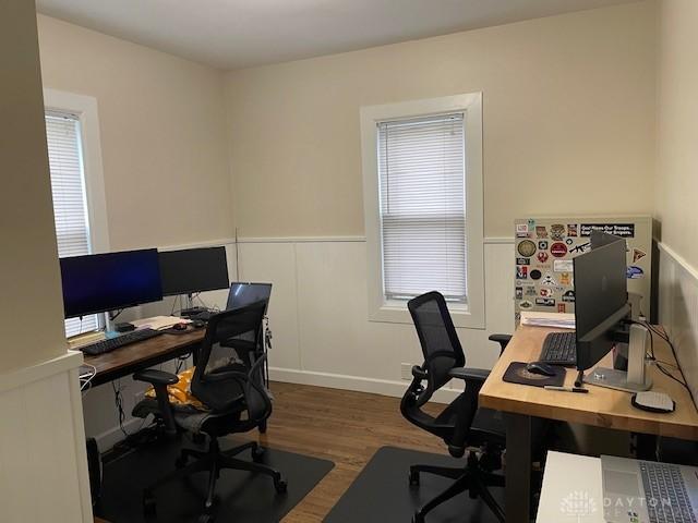 12 Harshman St, Brookville, OH 45309 - office area with wood finished floors and a wainscoted wall