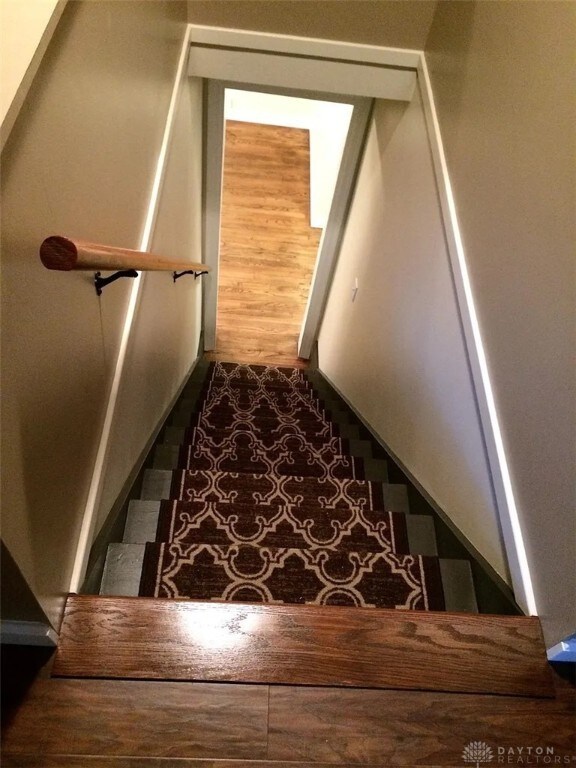 12 Harshman St, Brookville, OH 45309 - staircase with wood finished floors