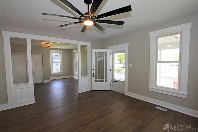 224 Suttman St, Miamisburg, OH 45342 - foyer featuring dark wood-type flooring, baseboards, and healthy amount of natural light