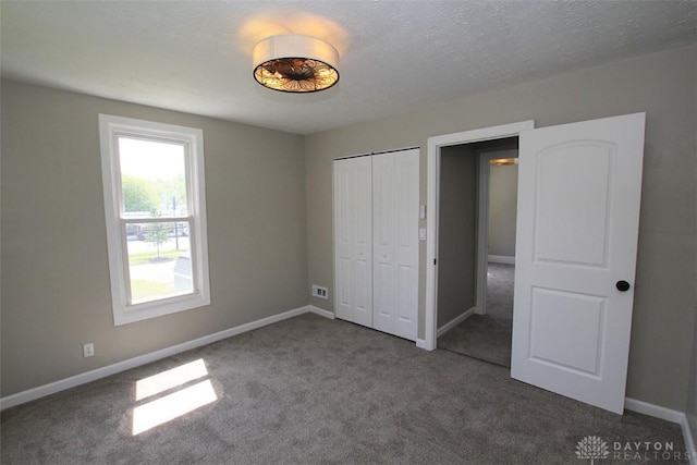 224 Suttman St, Miamisburg, OH 45342 - unfurnished bedroom featuring carpet floors, baseboards, and a closet