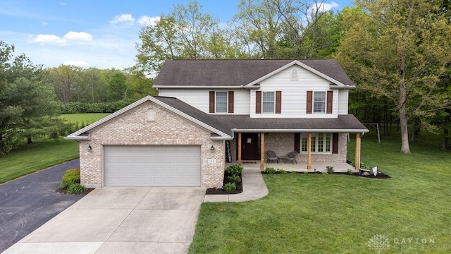 traditional home with concrete driveway, covered porch, a garage, brick siding, and a front lawn