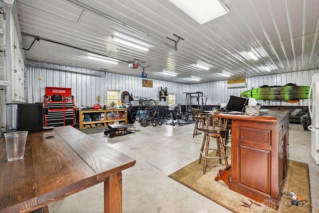 garage with a workshop area