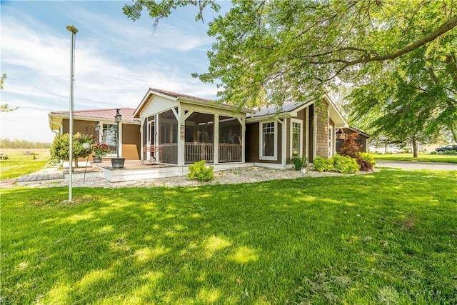294 New Gdn, New Paris, OH 45347 - back of house with a sunroom and a yard