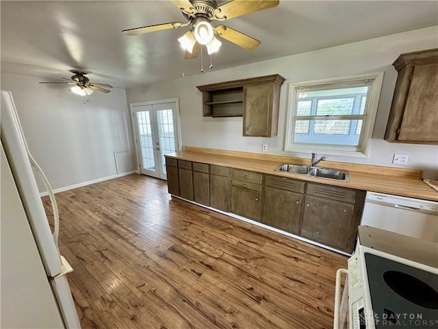 4832 Barnhart Ave, Dayton, OH 45432 - kitchen featuring a sink, open shelves, ceiling fan, wood finished floors, and french doors
