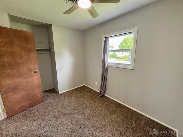 4832 Barnhart Ave, Dayton, OH 45432 - unfurnished bedroom with carpet, a ceiling fan, a closet, and baseboards