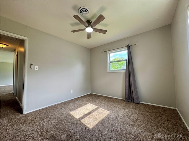 4832 Barnhart Ave, Dayton, OH 45432 - spare room featuring carpet flooring, ceiling fan, attic access, and baseboards