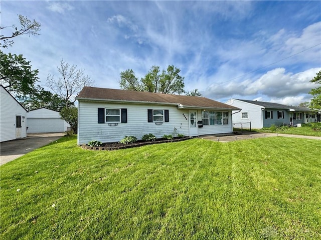 4832 Barnhart Ave, Dayton, OH 45432 - ranch-style home with a garage and a front lawn
