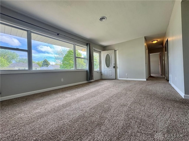 4832 Barnhart Ave, Dayton, OH 45432 - unfurnished living room with baseboards and carpet flooring