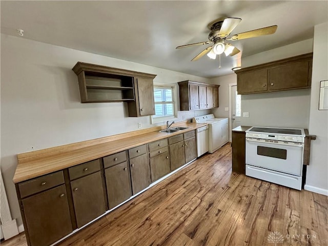 4832 Barnhart Ave, Dayton, OH 45432 - kitchen with white appliances, washer and dryer, a sink, a ceiling fan, and open shelves