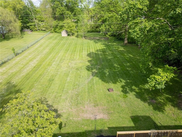 2182 La Grange Rd, Beavercreek, OH 45431 - view of green lawn with a shed and an outdoor structure