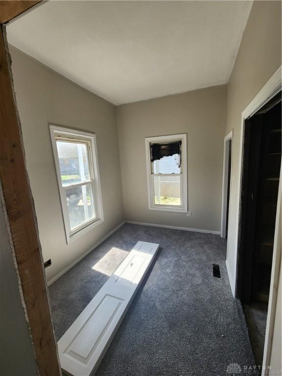 35 Utah Ct, Dayton, OH 45410 - carpeted empty room featuring healthy amount of natural light