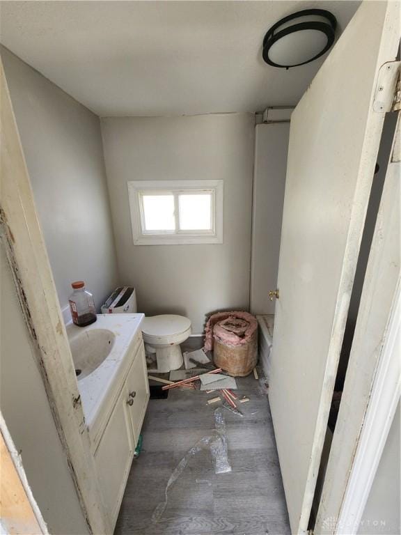 35 Utah Ct, Dayton, OH 45410 - half bath with vanity and wood finished floors
