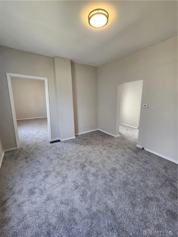 35 Utah Ct, Dayton, OH 45410 - carpeted empty room with baseboards
