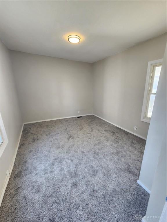 35 Utah Ct, Dayton, OH 45410 - carpeted spare room featuring baseboards