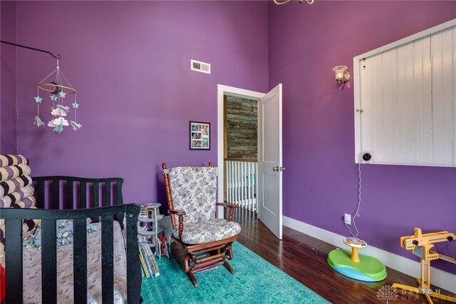 1803 Resor Rd, Fairfield, OH 45014 - bedroom featuring wood finished floors, a high ceiling, and baseboards