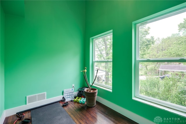 1803 Resor Rd, Fairfield, OH 45014 - exercise room featuring dark wood-style floors, plenty of natural light, and baseboards