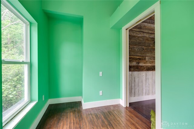 1803 Resor Rd, Fairfield, OH 45014 - spare room with baseboards, dark wood-type flooring, and plenty of natural light