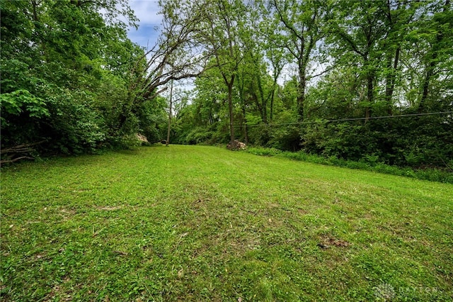 1803 Resor Rd, Fairfield, OH 45014 - view of grassy yard featuring a forest view