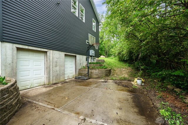 1803 Resor Rd, Fairfield, OH 45014 - view of home's exterior with a garage and driveway