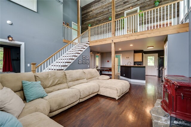 1803 Resor Rd, Fairfield, OH 45014 - living room featuring a towering ceiling, dark wood-type flooring, and stairway