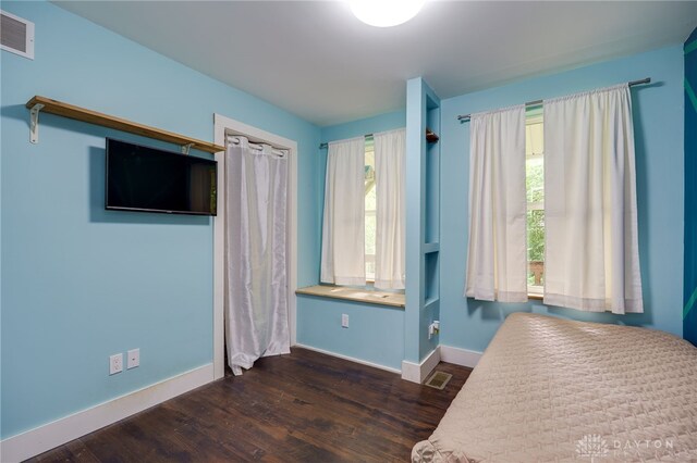 1803 Resor Rd, Fairfield, OH 45014 - bedroom featuring dark wood-type flooring, multiple windows, and baseboards