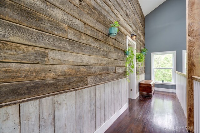 1803 Resor Rd, Fairfield, OH 45014 - corridor featuring wood walls, high vaulted ceiling, wood finished floors, and baseboards