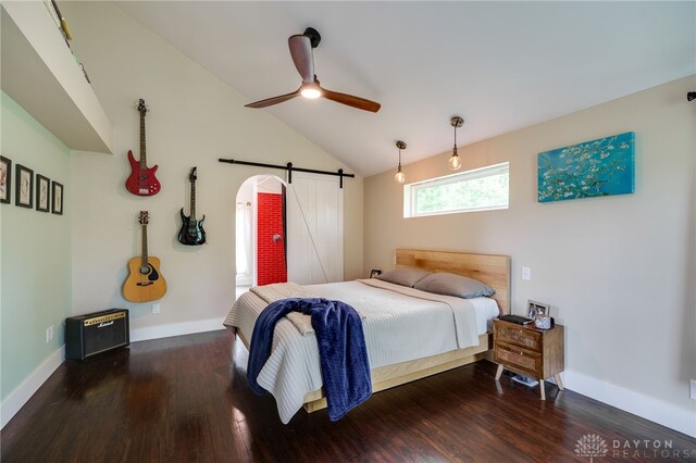 1803 Resor Rd, Fairfield, OH 45014 - bedroom with a barn door, wood finished floors, baseboards, lofted ceiling, and a ceiling fan