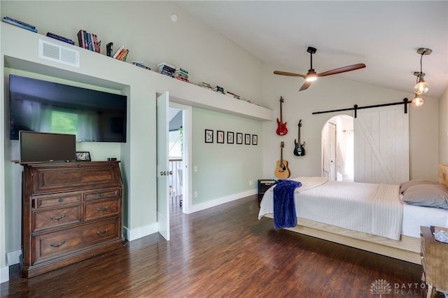 1803 Resor Rd, Fairfield, OH 45014 - bedroom featuring a barn door, lofted ceiling, dark wood-style floors, and baseboards
