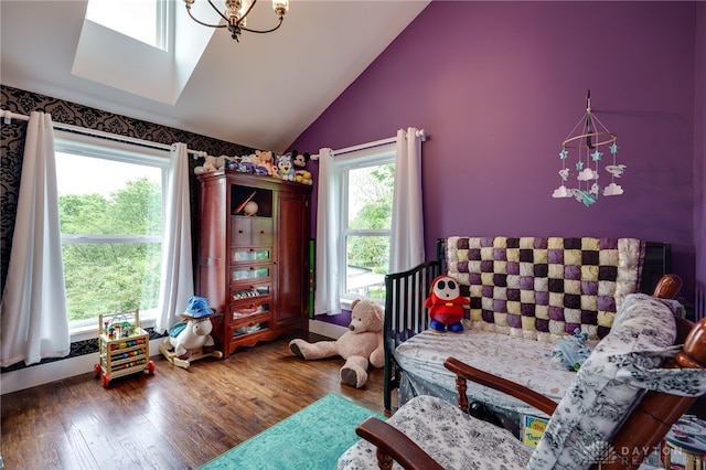 1803 Resor Rd, Fairfield, OH 45014 - bedroom featuring multiple windows, vaulted ceiling, wood finished floors, and a skylight