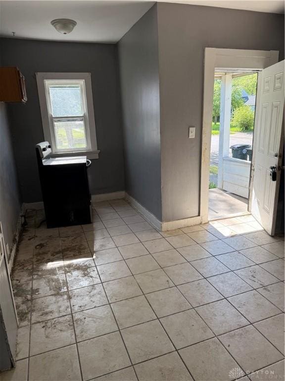 90 S Sperling Ave Unit 88, Dayton, OH 45403 - spare room with plenty of natural light, baseboards, and light tile patterned floors
