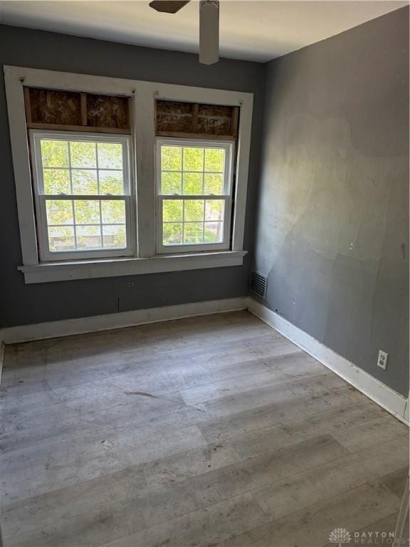 90 S Sperling Ave Unit 88, Dayton, OH 45403 - spare room with wood finished floors, ceiling fan, and baseboards