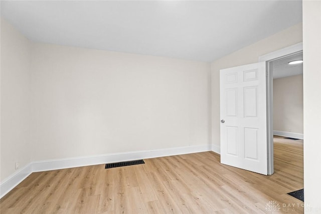 1235 W Jefferson St, Springfield, OH 45506 - spare room featuring light wood-style flooring and baseboards