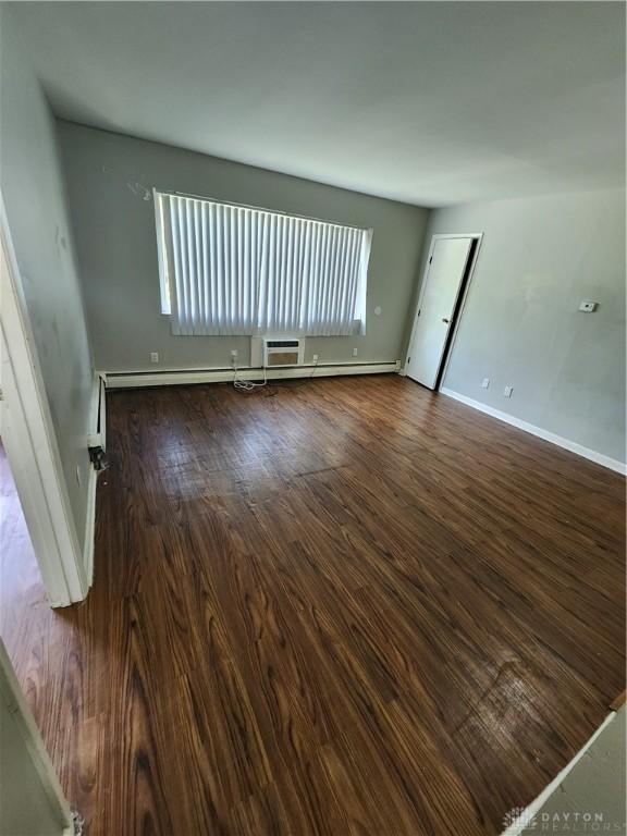 2620 N Gettysburg Ave, Dayton, OH 45406 - spare room with wood finished floors and baseboards