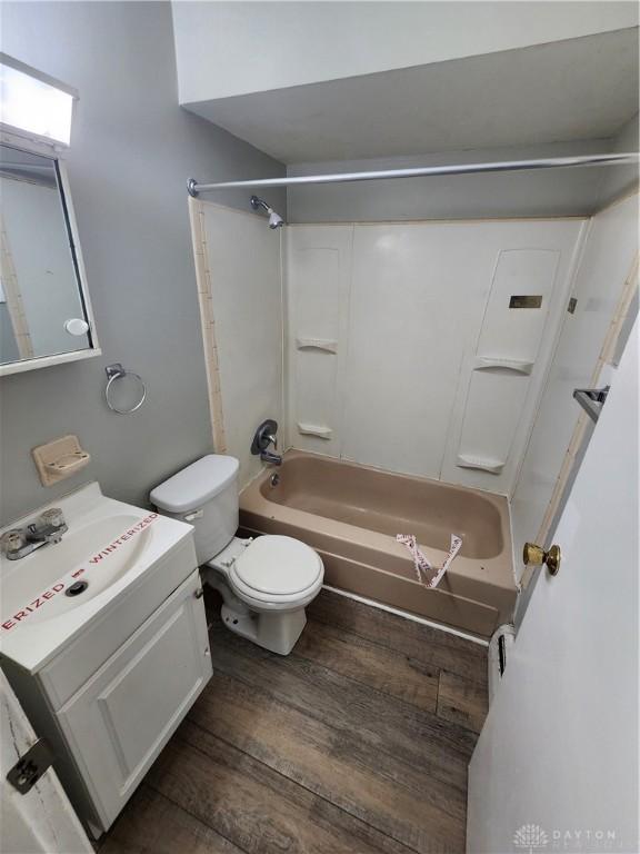 2620 N Gettysburg Ave, Dayton, OH 45406 - full bath featuring wood finished floors,  shower combination, toilet, and vanity