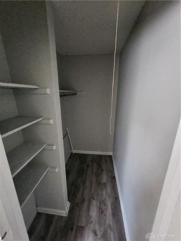 2620 N Gettysburg Ave, Dayton, OH 45406 - walk in closet with wood finished floors