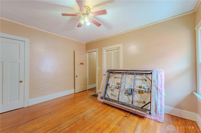 2108 Auburn Ave, Dayton, OH 45406 - bedroom with baseboards, wood finished floors, crown molding, and ceiling fan