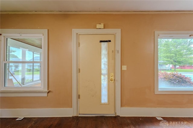 2108 Auburn Ave, Dayton, OH 45406 - entryway with healthy amount of natural light, baseboards, dark wood finished floors, and crown molding