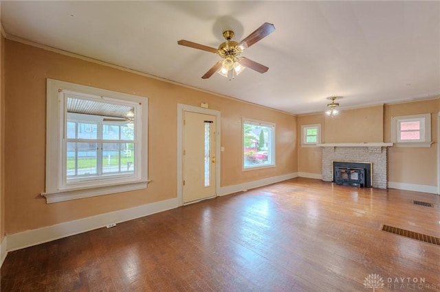 2108 Auburn Ave, Dayton, OH 45406 - unfurnished living room with ornamental molding, baseboards, a fireplace, wood finished floors, and ceiling fan