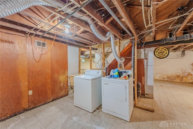 2108 Auburn Ave, Dayton, OH 45406 - clothes washing area with separate washer and dryer and tile patterned floors