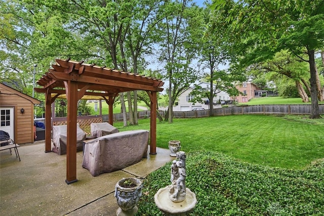 view of yard with a pergola and a patio