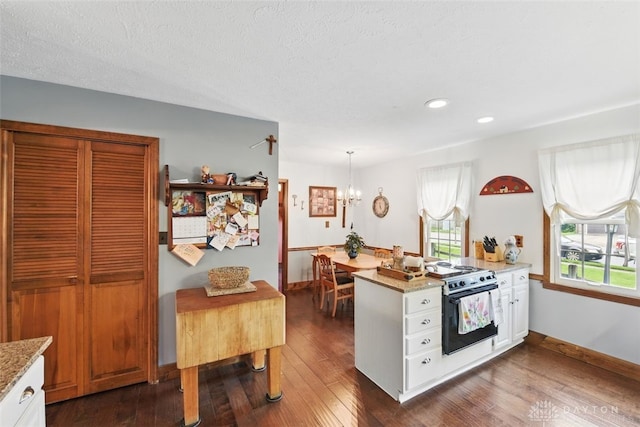 kitchen with electric range, a chandelier, recessed lighting, baseboards, and dark wood-style flooring