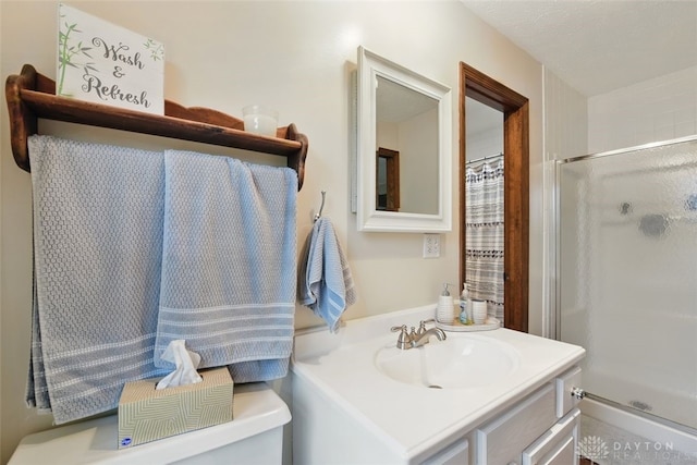 full bath featuring a shower stall and vanity