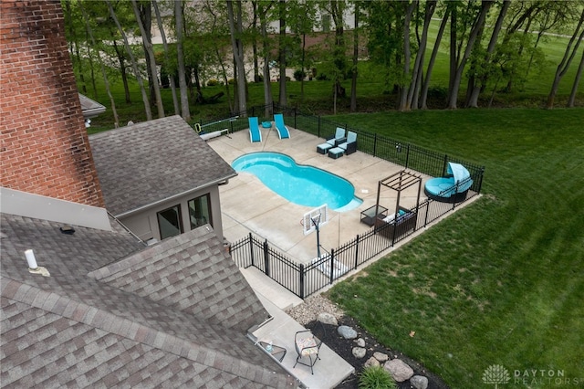 view of swimming pool with a patio
