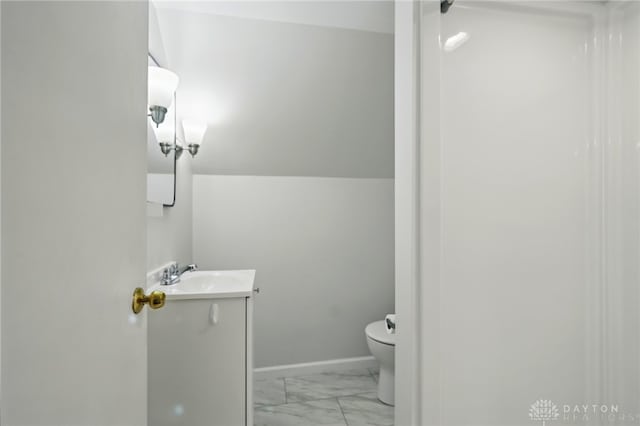 2917 California Ave, Dayton, OH 45419 - half bath featuring marble finish flooring, vanity, toilet, and baseboards