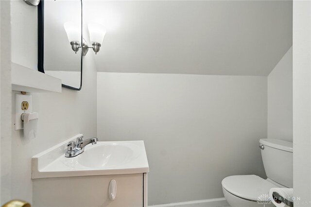 2917 California Ave, Dayton, OH 45419 - bathroom with toilet, vanity, and baseboards