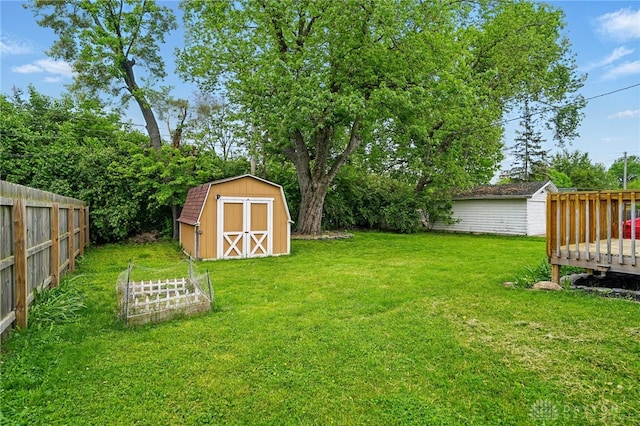 2917 California Ave, Dayton, OH 45419 - view of yard with a storage shed, an outbuilding, and a deck