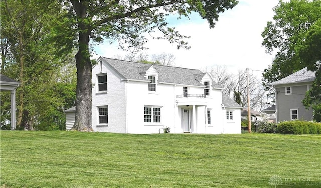 465 W Staunton Rd, Troy, OH 45373 - view of front of property featuring a front lawn and a balcony