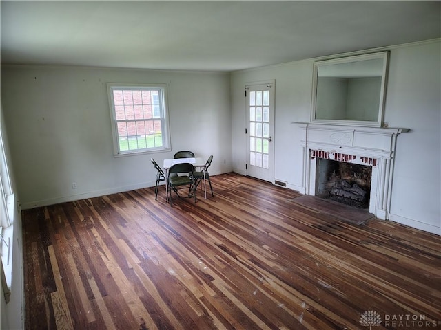 465 W Staunton Rd, Troy, OH 45373 - living room featuring hardwood / wood-style floors, a fireplace, healthy amount of natural light, ornamental molding, and baseboards