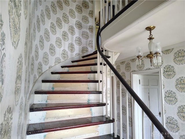 465 W Staunton Rd, Troy, OH 45373 - staircase featuring wallpapered walls, a chandelier, and crown molding